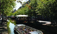 Amsterdam bus tour con guida dal vivo e crociera sui canali
