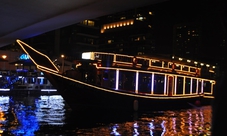 Dubai city tour with desert safari and dhow boat dinner cruise combo