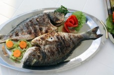 Regala un corso di cucina a base di pesce