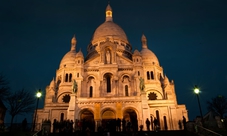 Parigi di notte: tour della città illuminata e Moulin Rouge con Champagne