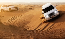 Hummer safari from Dubai: dune-bashing, camel riding and traditional food