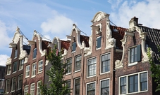 Amsterdam bus tour con guida dal vivo e crociera sui canali