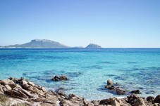 Esperienza di volo in ultraleggero sopra le splendide acque della Sardegna