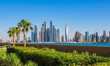 Dubai city tour with desert safari and dhow boat dinner cruise combo
