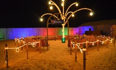 Hummer safari from Dubai: dune-bashing, camel riding and traditional food